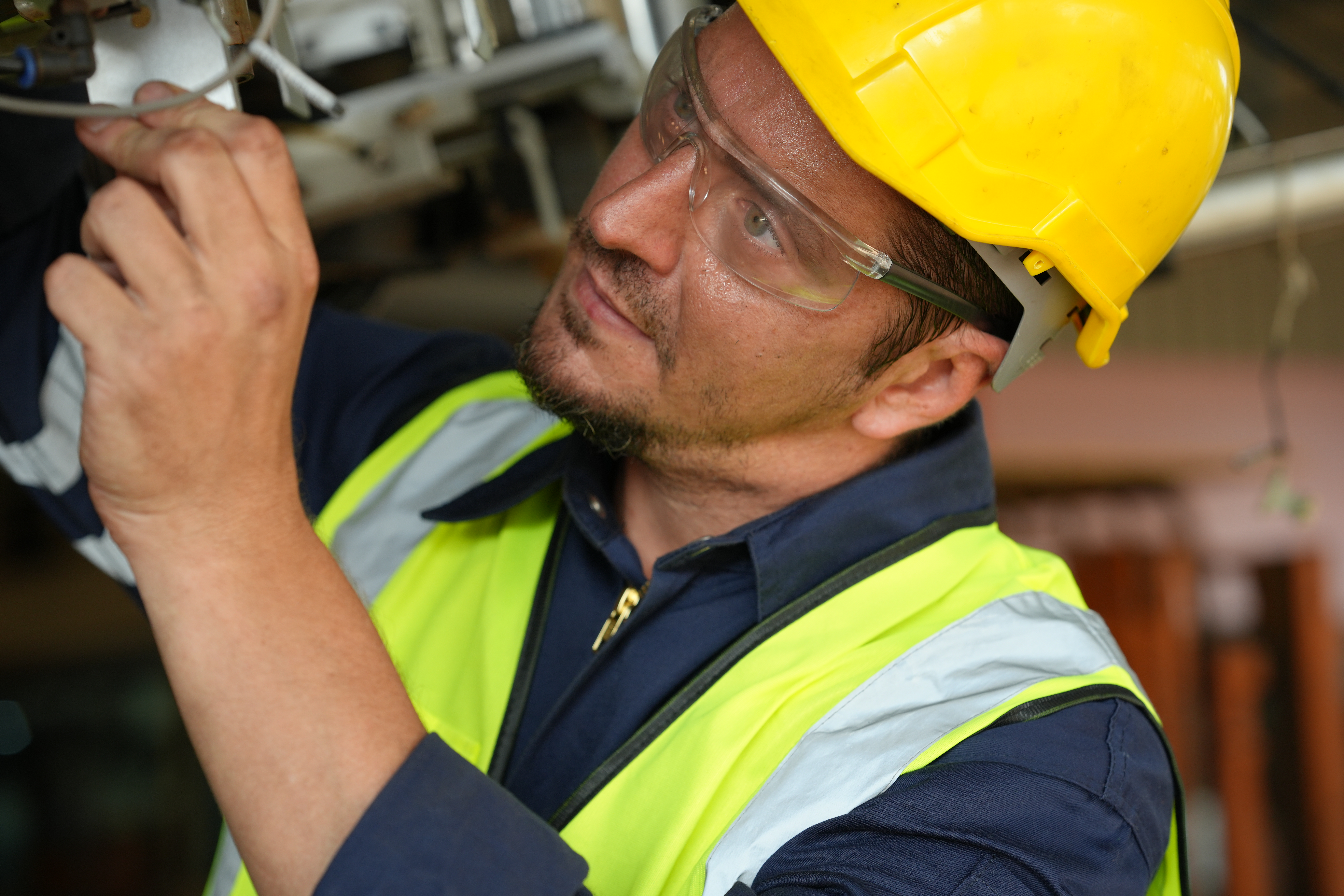 robotic-arm-engineer-check-on-equipment-in-its-wit-2023-11-27-05-30-18-utc