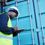 black-male-warehouse-management-shipping-logistics-manager