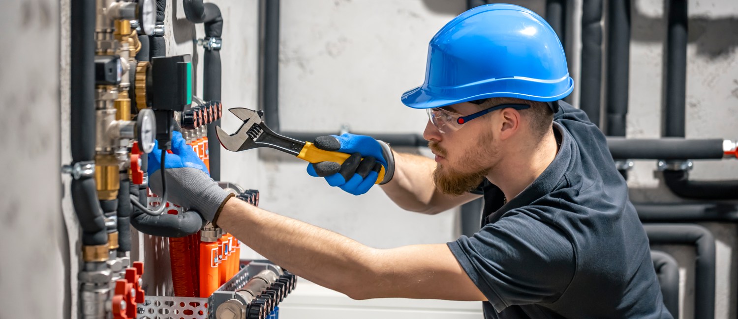 technician-checking-heating-system-boiler-room pvproductions